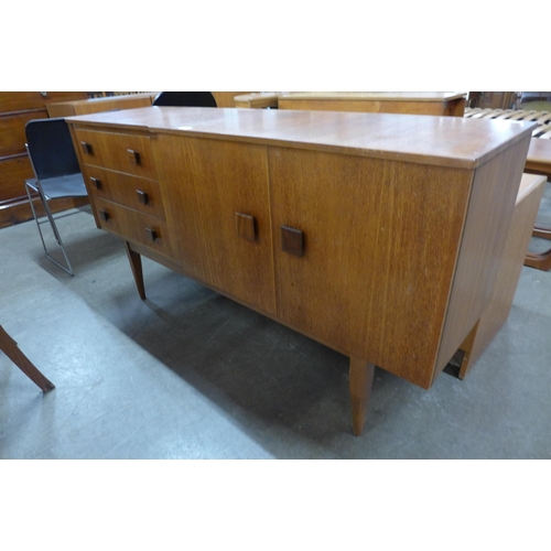 53 - A teak sideboard