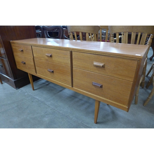 63 - A teak sideboard