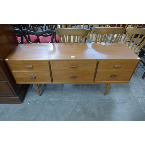 63 - A teak sideboard