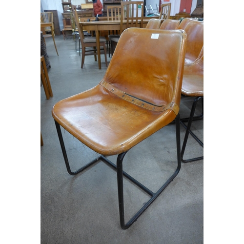 67 - A set of ten tan leather and black steel chairs