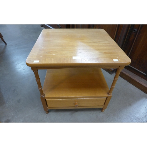 70 - A Nathan teak side table