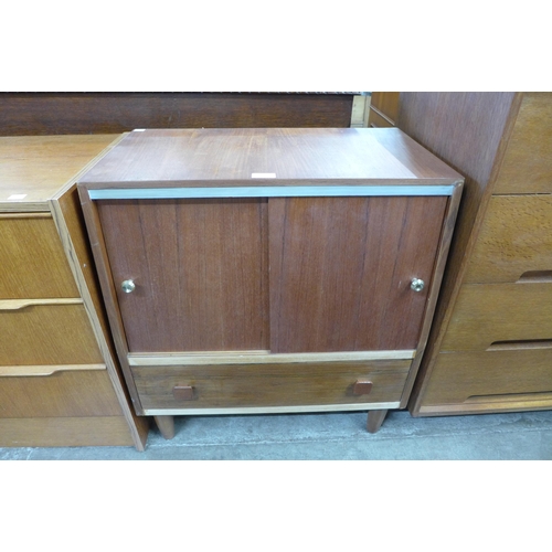 77 - A teak record cabinet