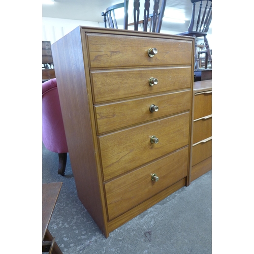 79 - A teak chest of drawers