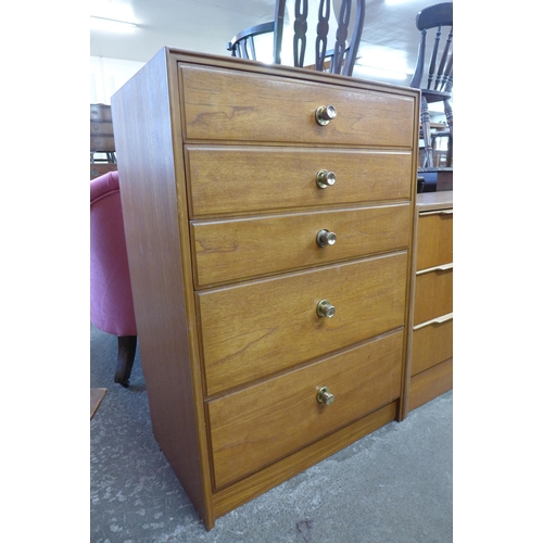 79 - A teak chest of drawers