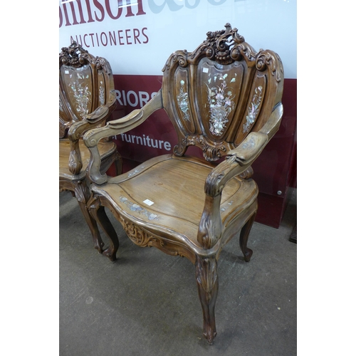 8 - A pair of Chinese carved hardwood and mother of pearl inlaid armchairs