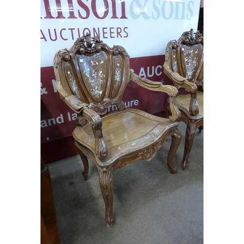 8 - A pair of Chinese carved hardwood and mother of pearl inlaid armchairs