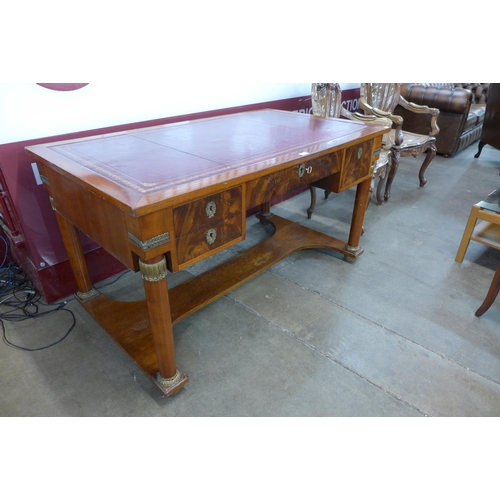 9 - A 19th Century French Empire style mahogany and red leather topped bureau plat