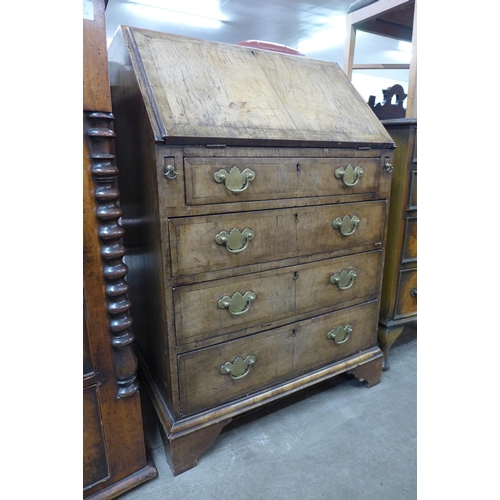 94 - A George I style walnut bureau