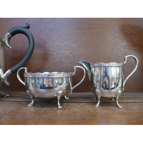 606 - A four piece Rockingham silver plated tea service