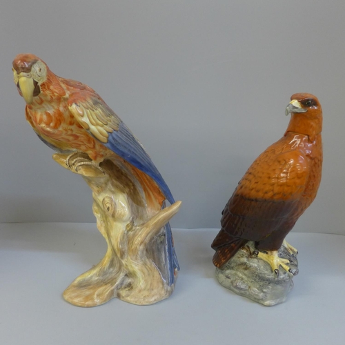 607 - A pottery parrot and an eagle decanter