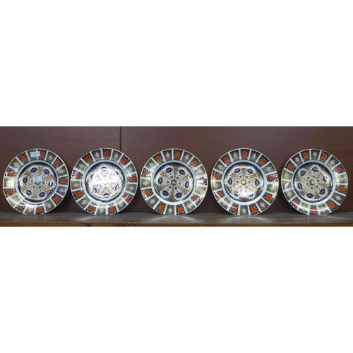 613 - Five Royal Crown Derby Imari dinner plates, 27cm, (four seconds)