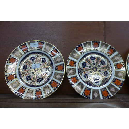 613 - Five Royal Crown Derby Imari dinner plates, 27cm, (four seconds)