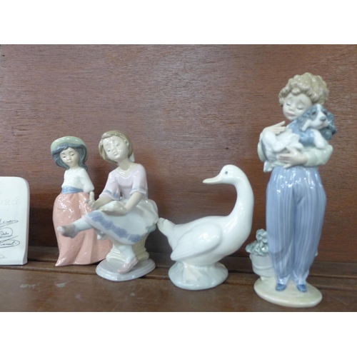 616 - Six Lladro, Nao and other Spanish figures of children and a young girl, a Lladro Collector's Society... 