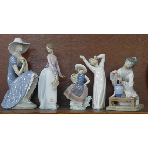 617 - Four Lladro figures and one Nao, two a/f, fingers missing