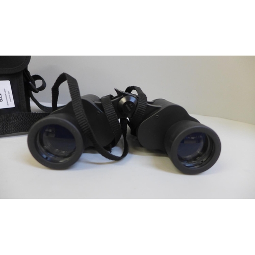 621 - A pair of Bushnell 7x35 binoculars, with soft case