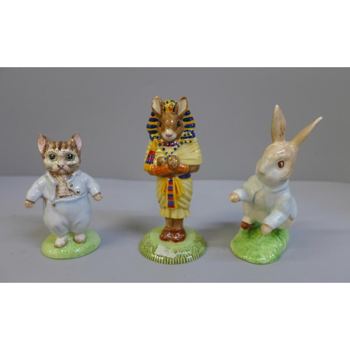 628 - Two Beswick Peter Rabbit figures, Tom Kitten and Peter Rabbit and a Royal Doulton Tutankhamun Bunnyk... 