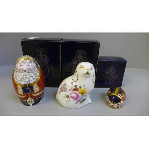 648 - Three Royal Crown Derby paperweights, Santa Claus, Spaniel and Ladybird, boxed