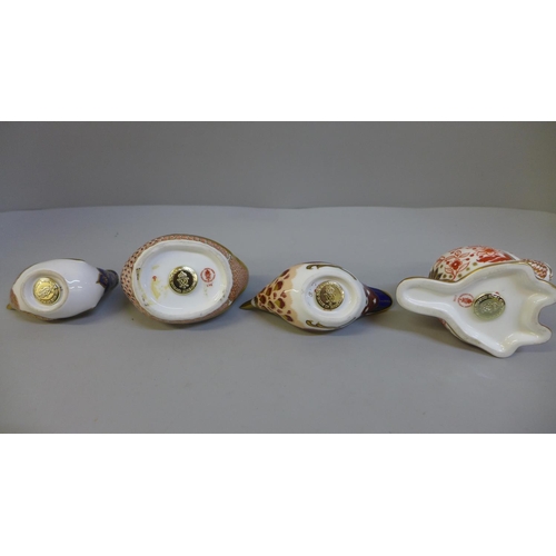 656 - Four Royal Crown Derby paperweights including Hen and Beaver, all with gold stoppers