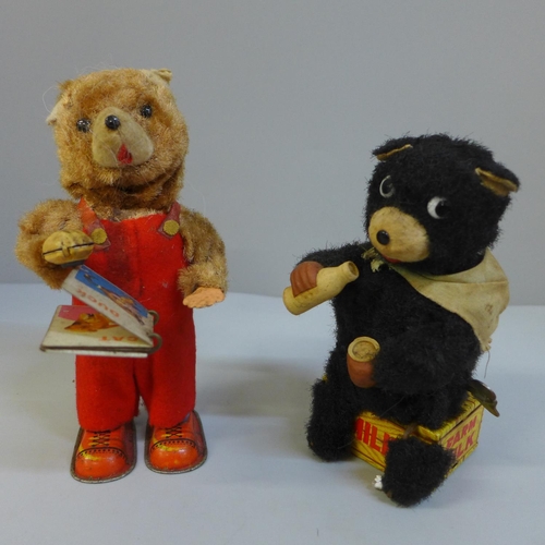 666 - Two vintage clockwork teddy toys