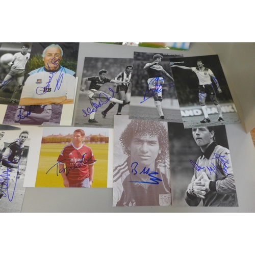 672 - A collection of 32 West Ham United signed photos, Brooking, Peters, Noble, etc.