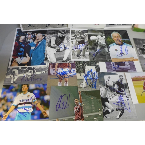 672 - A collection of 32 West Ham United signed photos, Brooking, Peters, Noble, etc.