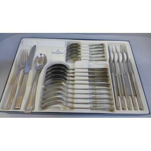 682 - A Villeroy & Boch cutlery set, boxed and a wooden cased canteen of community plate cutlery