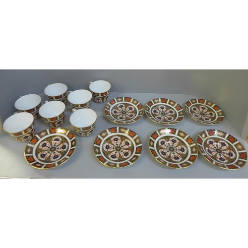 691 - Seven Royal Crown Derby Imari tea cups and saucers, some seconds