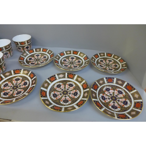 691 - Seven Royal Crown Derby Imari tea cups and saucers, some seconds