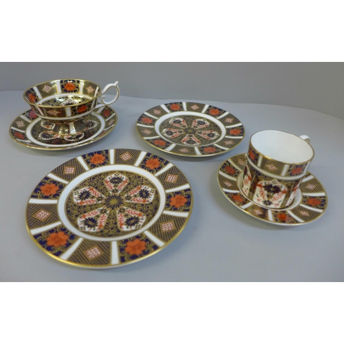 694 - A Royal Crown Derby Imari coffee can and saucer, (second) tea cup and saucer and two side plates, (p... 