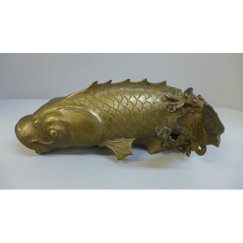 696 - A Japanese bronze leaping carp figure (some repairs needed at base, tail, etc.)