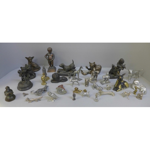 698 - A collection of metal animals including a bronze lion