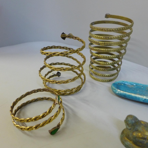 709 - Three bangles and other items including a metal fish figure