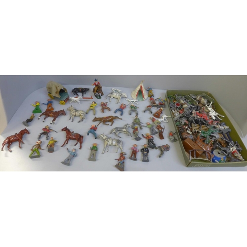 710 - A collection of lead animals including Cowboys, Soldiers, etc.