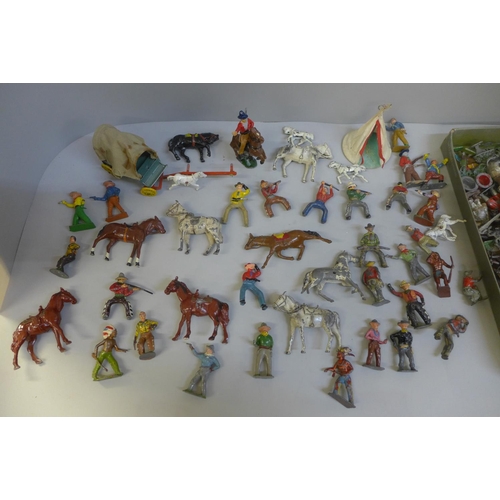 710 - A collection of lead animals including Cowboys, Soldiers, etc.