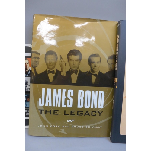 720 - A 'Bond on Bond' limited edition book, signd by Roger Moore plus two other James Bond related books