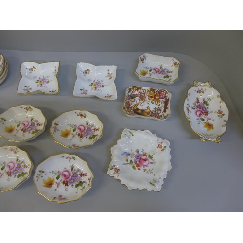 721 - Twenty-five Royal Crown Derby pin dishes, various shapes