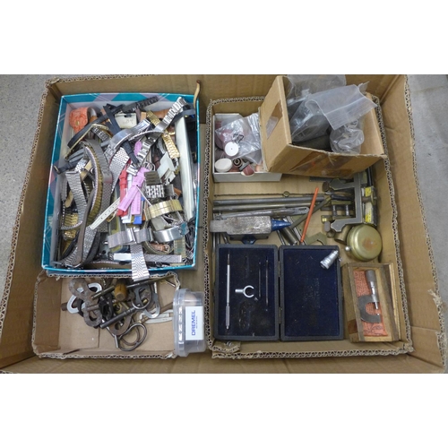 745 - A box of watch movements, watch glasses, watch straps, tools, etc.