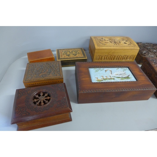 780 - A collection of eight carved wooden boxes