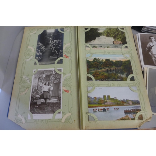 784 - Two albums of postcards including early 20th century, and a collection of photographic postcards