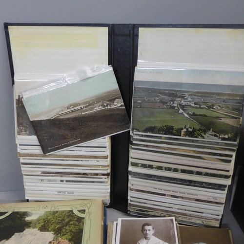 784 - Two albums of postcards including early 20th century, and a collection of photographic postcards