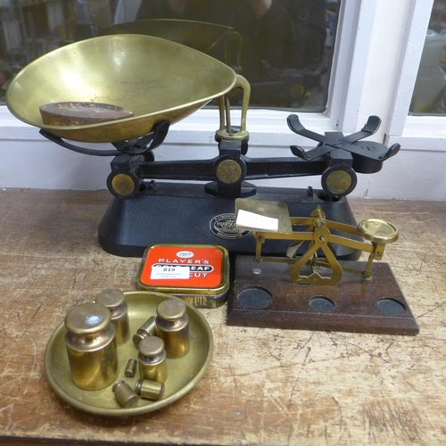 819 - A set of The Viking Kitchen Scales and weights and a set of postal scales and weights