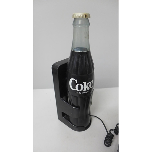 820 - A novelty Coke bottle telephone