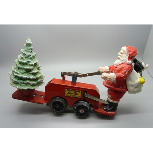 843 - A Lionel Santa car with Mickey Mouse, one wheel loose, boxed