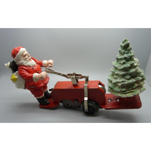 843 - A Lionel Santa car with Mickey Mouse, one wheel loose, boxed