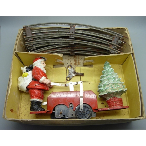 843 - A Lionel Santa car with Mickey Mouse, one wheel loose, boxed