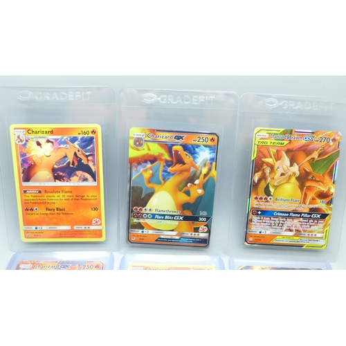 854 - Ten Ultra rare Charizard Pokemon cards