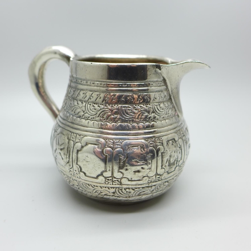 879 - A silver jug, George Fox maker, London 1870, 91g