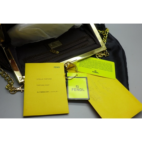 896 - A Fendi handbag with papers, manufactured from Tortuga Calf