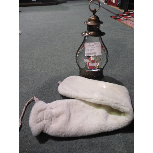 3016 - Holiday Scene Lantern and a So Long Hot Water Bottle (2ltr)(283-32,34) * This lot is subject to VAT