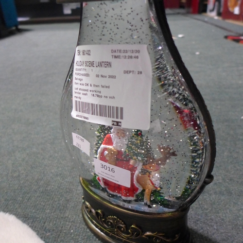 3016 - Holiday Scene Lantern and a So Long Hot Water Bottle (2ltr)(283-32,34) * This lot is subject to VAT